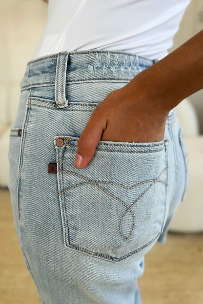 Light-wash Judy Blue high waist distressed straight jeans, full size, with frayed hem and classic denim style.