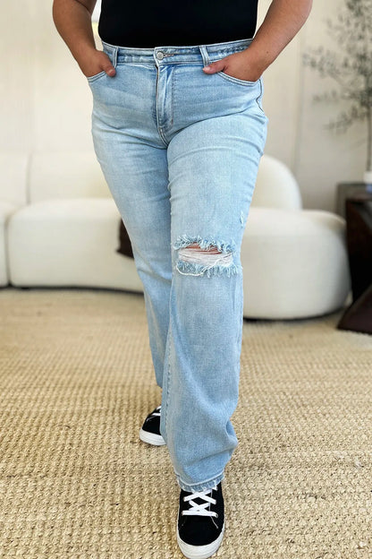 Light wash Judy Blue high waist distressed straight jeans with frayed hems and classic five-pocket design.