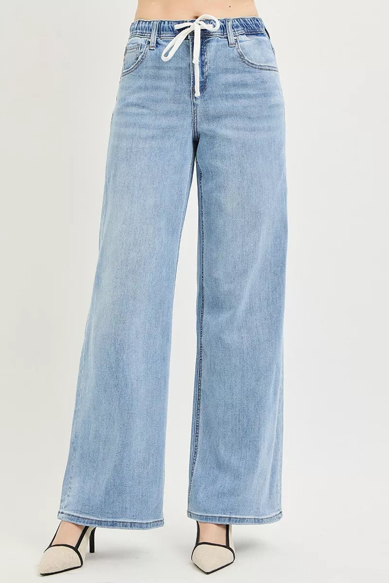 Light-colored RISEN elastic band slouchy wide jeans with drawstring, casual relaxed fit, by Trendsi.