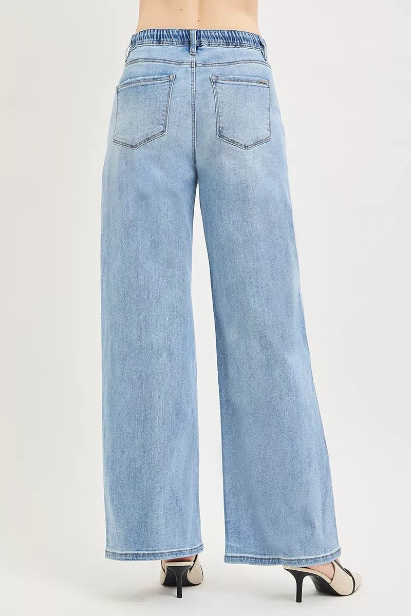Light-colored RISEN elastic band slouchy wide jeans with drawstring, relaxed fit, and casual style.