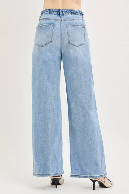 Light-colored RISEN elastic band slouchy wide jeans with drawstring, relaxed fit, and casual style.
