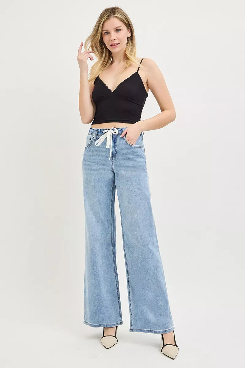 Light blue RISEN elastic band slouchy wide jeans with drawstring, casual denim pants for comfortable everyday wear.