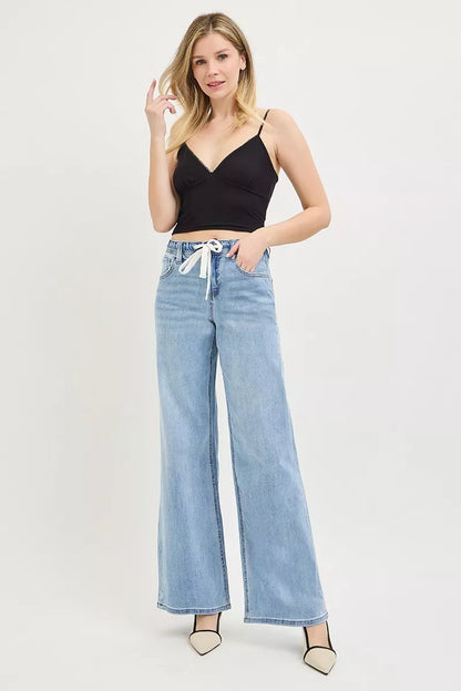 Light blue RISEN elastic band slouchy wide jeans with drawstring, casual denim pants for comfortable everyday wear.