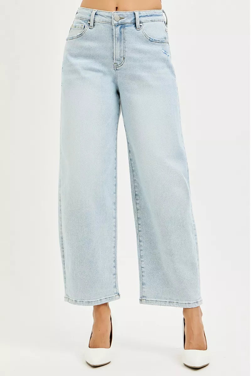 Light blue Risen high-rise crop barrel jeans from Trendsi, showcasing a fitted waist and classic denim styling.