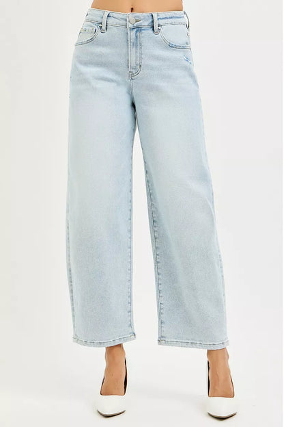 Light blue Risen high-rise crop barrel jeans from Trendsi, showcasing a fitted waist and classic denim styling.