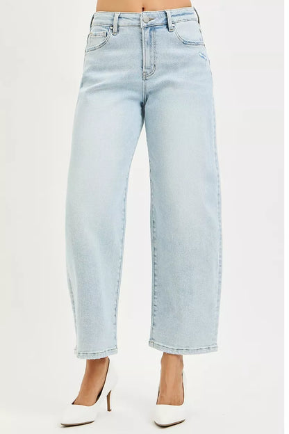Light blue Risen high-rise crop barrel jeans by Trendsi, showing fit and stylish cut on a model.