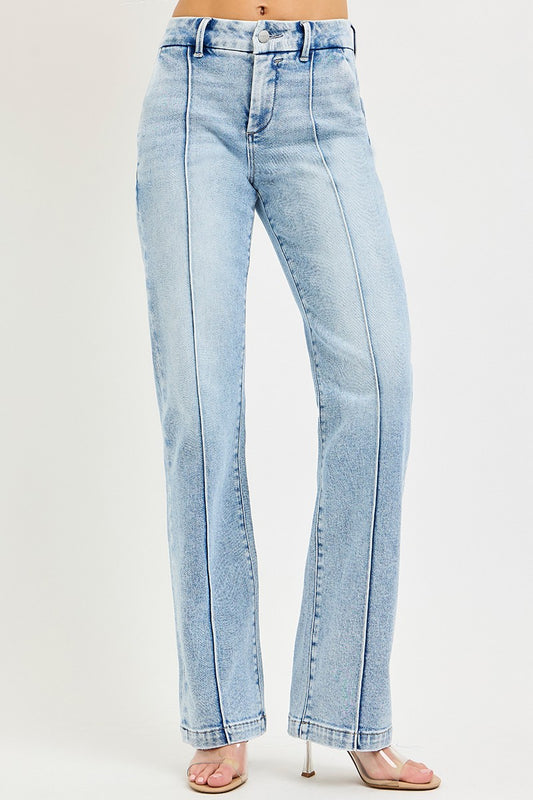 Light blue RISEN Tummy Control High Rise Straight Pin Tuck Jeans with front and back pockets on a white background.