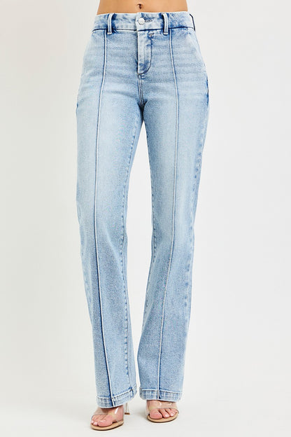 Light wash Risen Tummy Control High Rise Straight Jeans with pin tuck detailing, shown on a model.