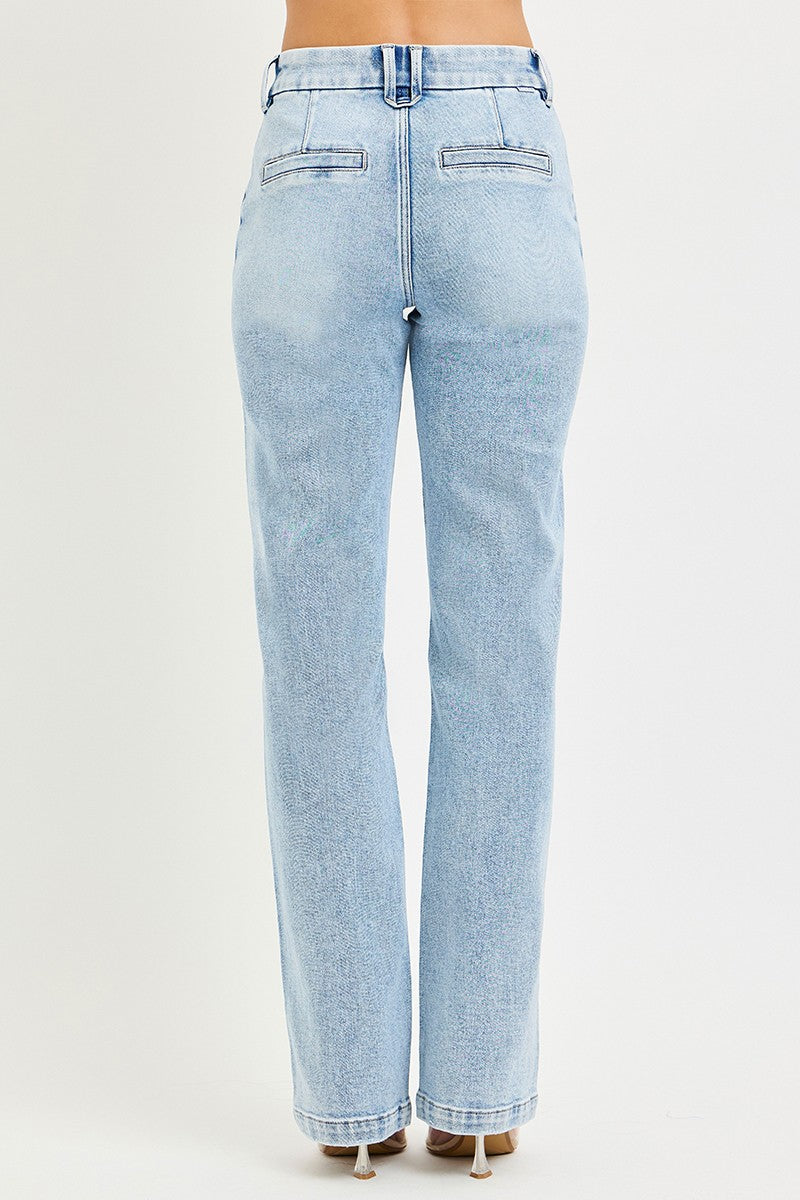Light wash Risen Tummy Control high-rise straight jeans with pin tuck details from Trendsi, shown on a model.