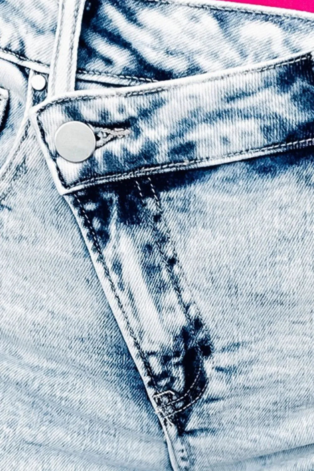 Light blue raw hem buttoned denim shorts with front and back pockets by Trendsi, casual summer denim shorts for women.