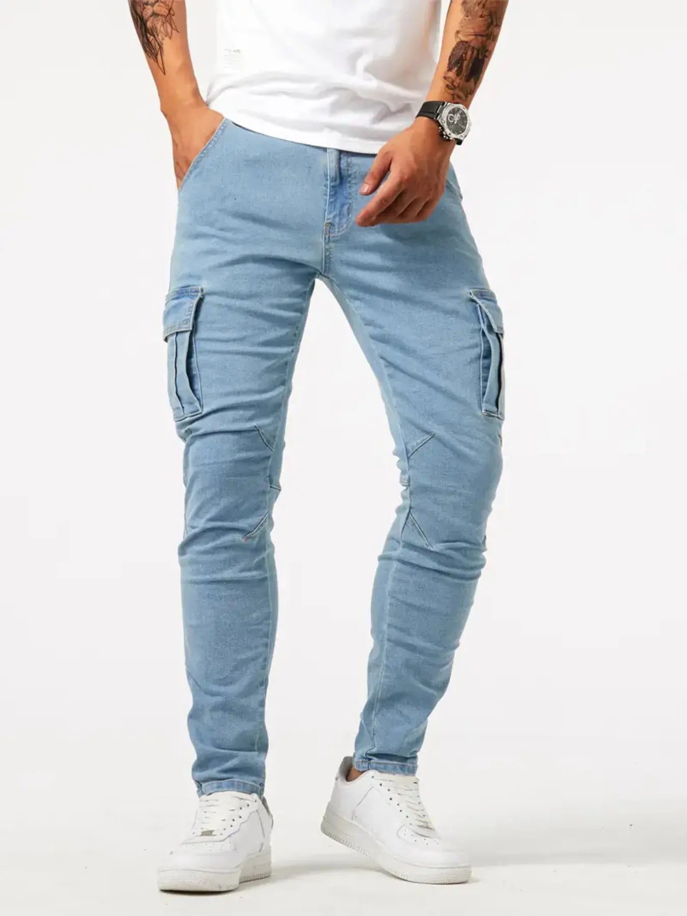 Light blue men's plus size skinny cargo jeans by Trendsi, showing a close-up of the slim fit style and cargo pocket details.