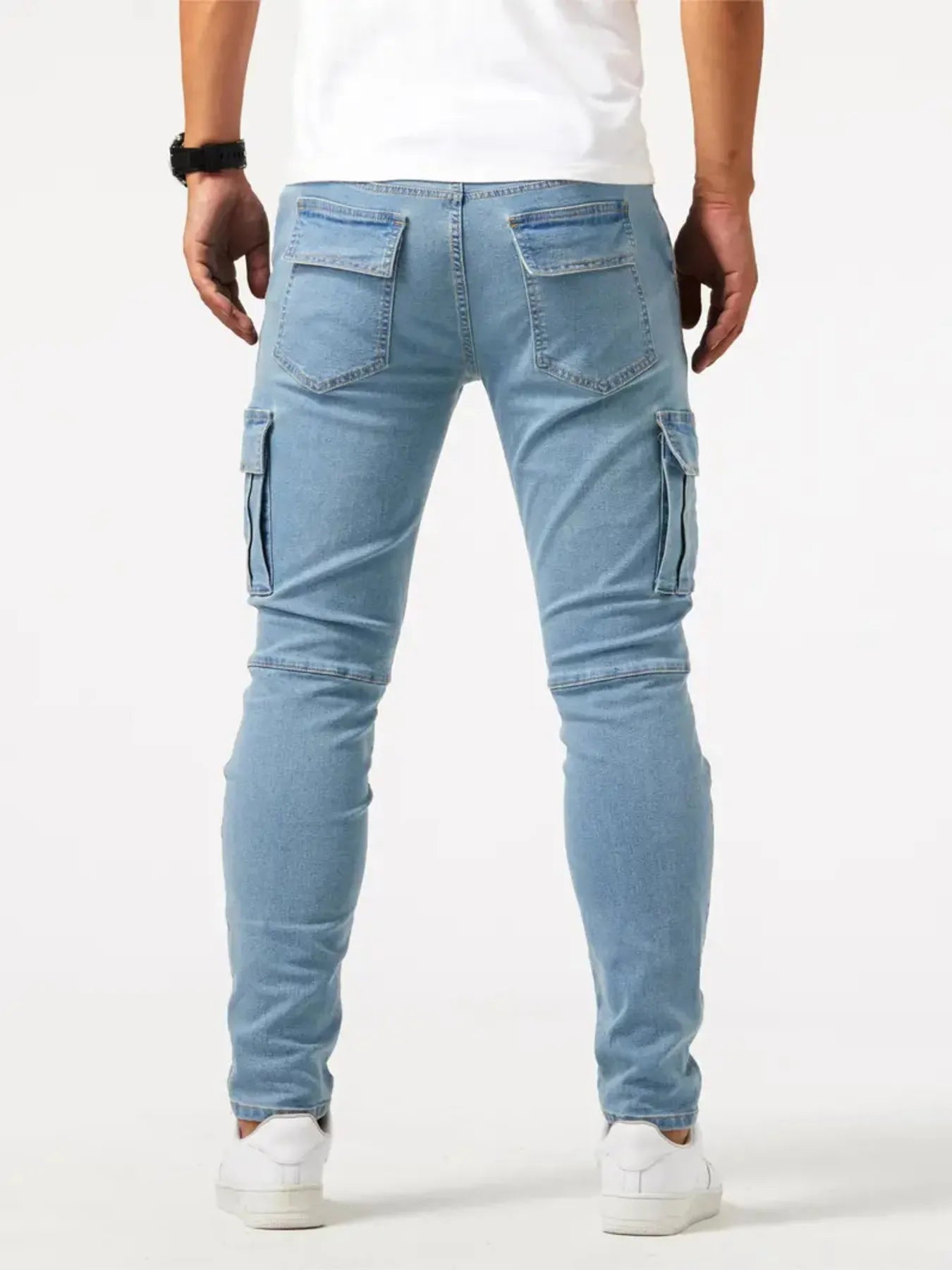 Light blue men's plus size skinny cargo jeans by Trendsi, featuring multiple pockets and a fitted style.