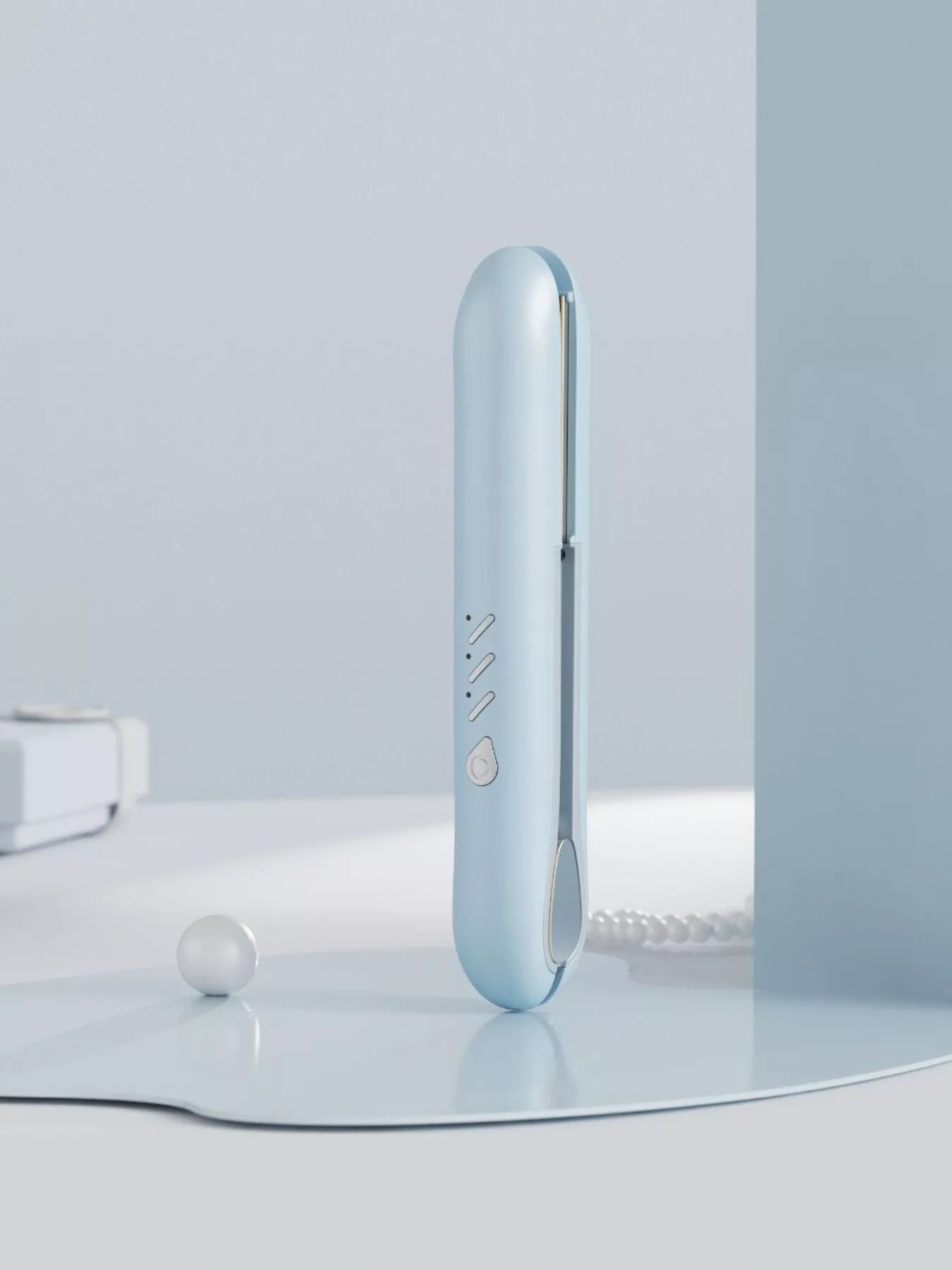 Light blue Trendsi fast heating hair straightener with sleek design and ceramic plates for smooth, straight hair styling.