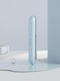 Light blue Trendsi fast heating hair straightener with sleek design and ceramic plates for smooth, straight hair styling.