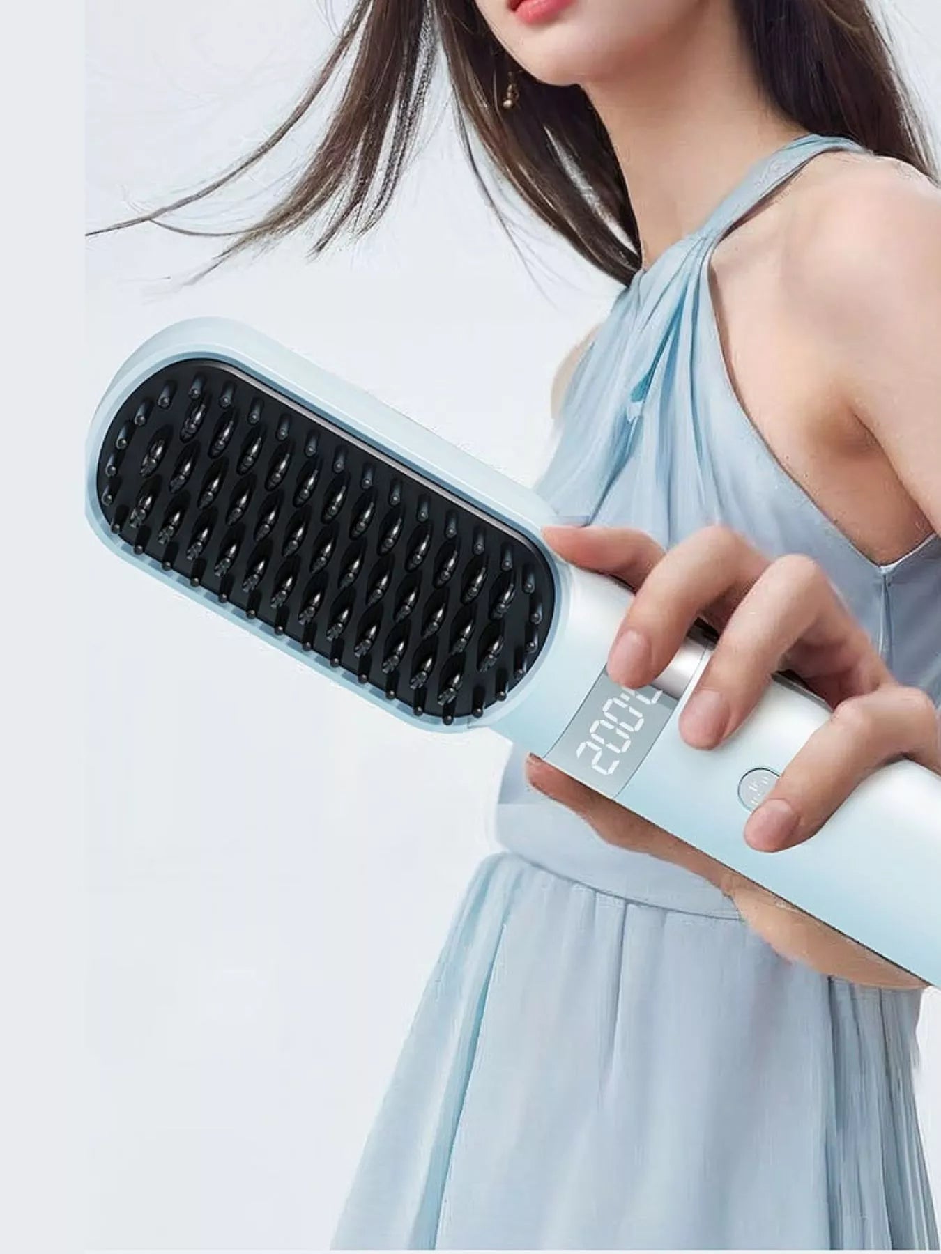 Light blue Trendsi fast heating LCD display straightening comb with ergonomic handle for smooth hair styling.