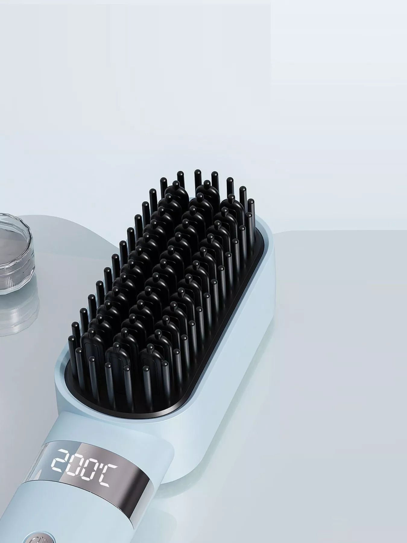 Light blue 2-in-1 portable wireless ionic brush straightener comb by Trendsi, featuring a compact design for easy styling.