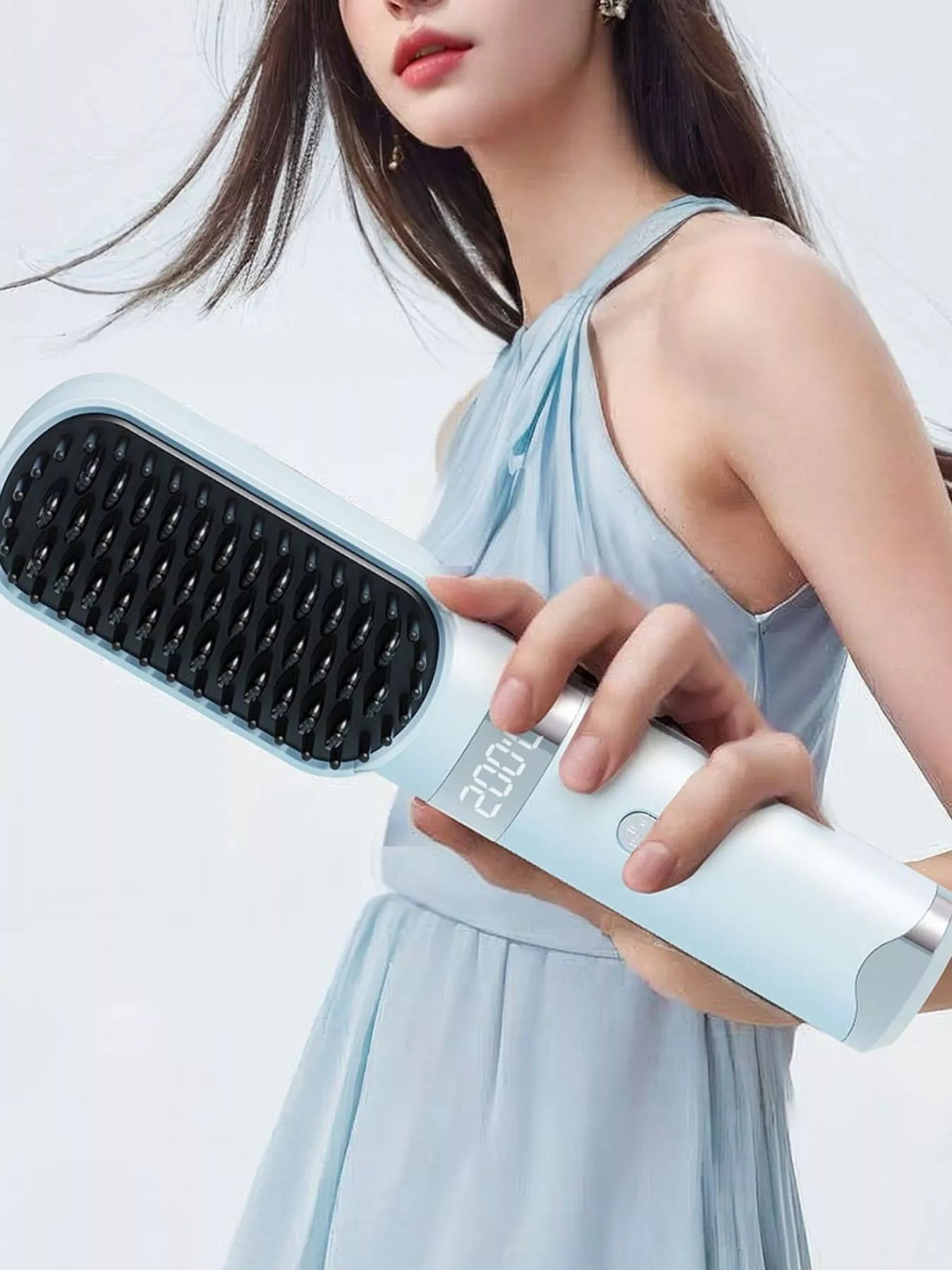 Light blue Trendsi fast heating straightening comb with wide teeth for smooth, straight hair styling.