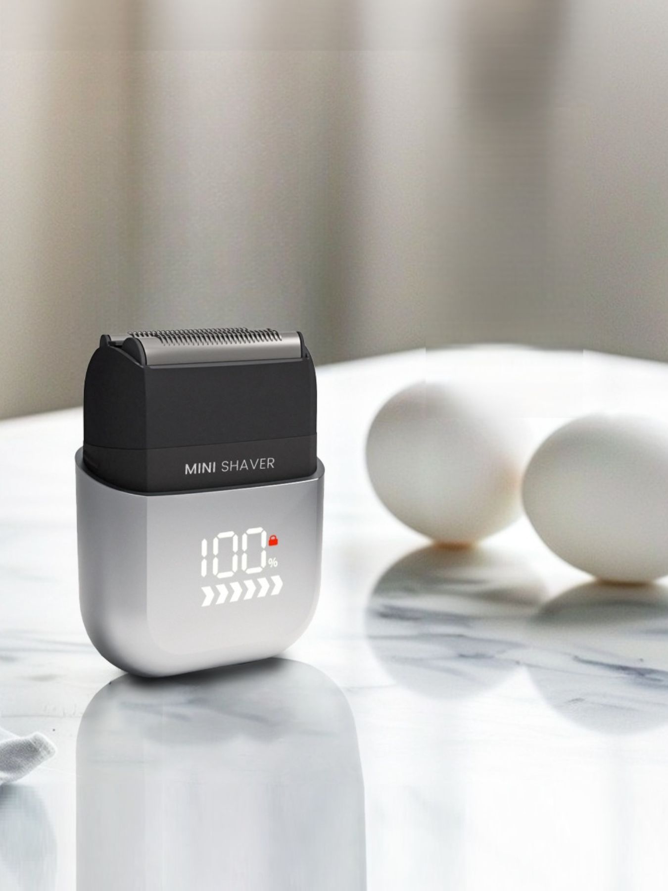 Light blue waterproof electric shaver by Trendsi with a sleek design, suitable for wet and dry shaving.