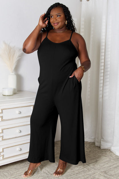 Light blue Basic Bae full-size spaghetti strap V-neck jumpsuit by Trendsi, showing the fitted bodice and wide-leg design.