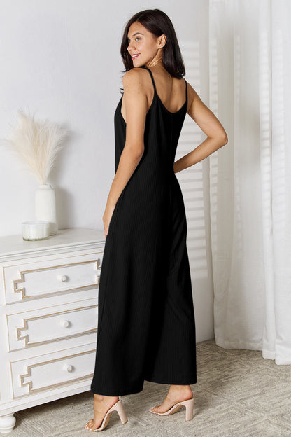 Light blue Trendsi Basic Bae full-size spaghetti strap V-neck jumpsuit displayed on a model.