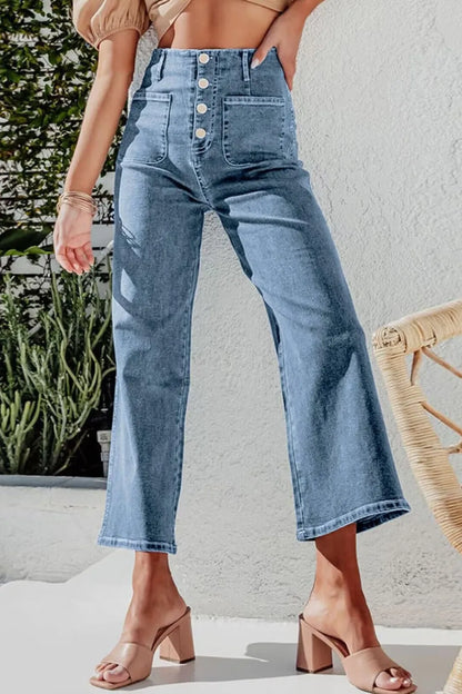 Light blue Trendsi button fly cropped wide-leg jeans displayed on a hanger with visible stitching and relaxed fit.