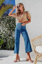 Light blue button fly cropped wide-leg jeans by Trendsi, showing relaxed fit and high-rise style with visible denim texture.