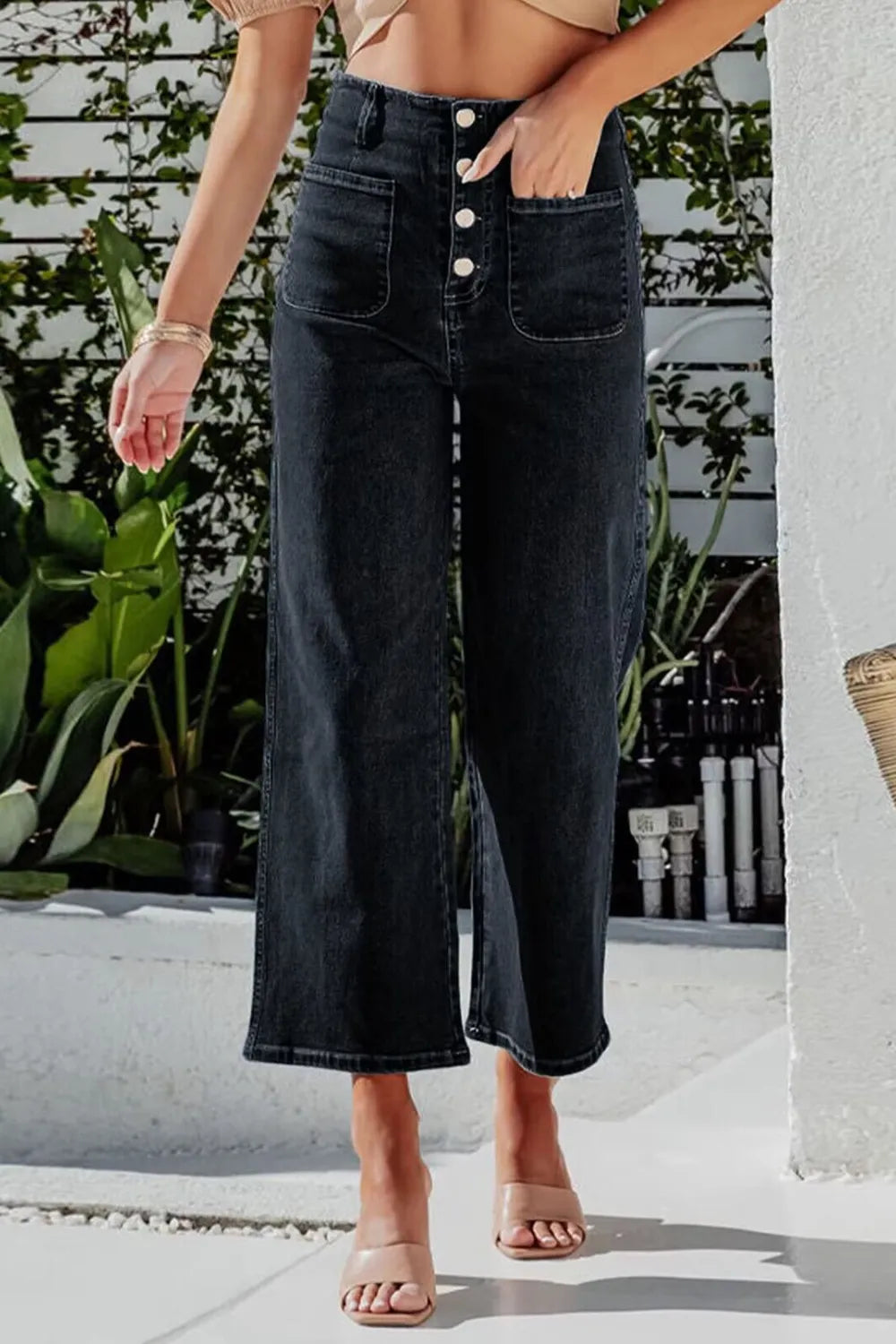 Light blue Trendsi button fly cropped wide leg jeans, showing the high-waisted design and relaxed fit with visible button closure.