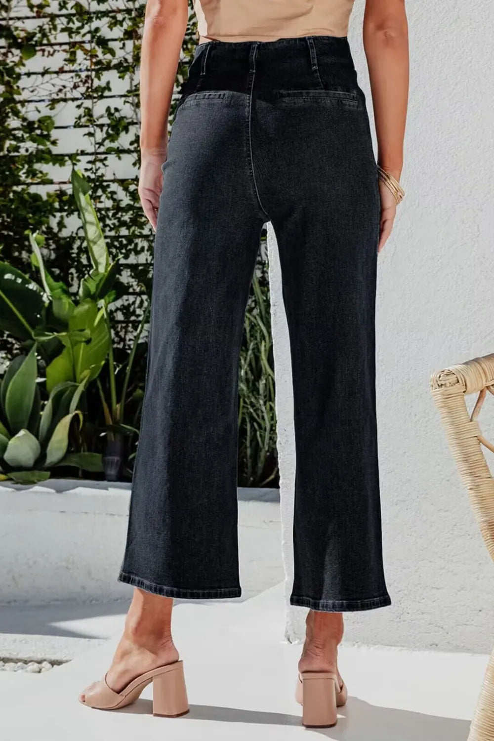 Light blue Trendsi button fly cropped wide leg jeans displayed on a model, showcasing high-waisted, relaxed fit denim.
