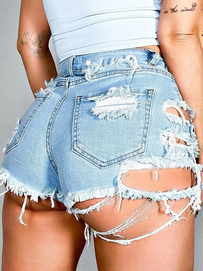 Light blue distressed denim shorts from Trendsi featuring frayed hems and casual fit, perfect for summer casual wear.