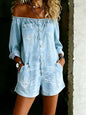 Light blue plus size button-down front off-shoulder romper by Trendsi, displayed on a model, with relaxed fit and stylish design.
