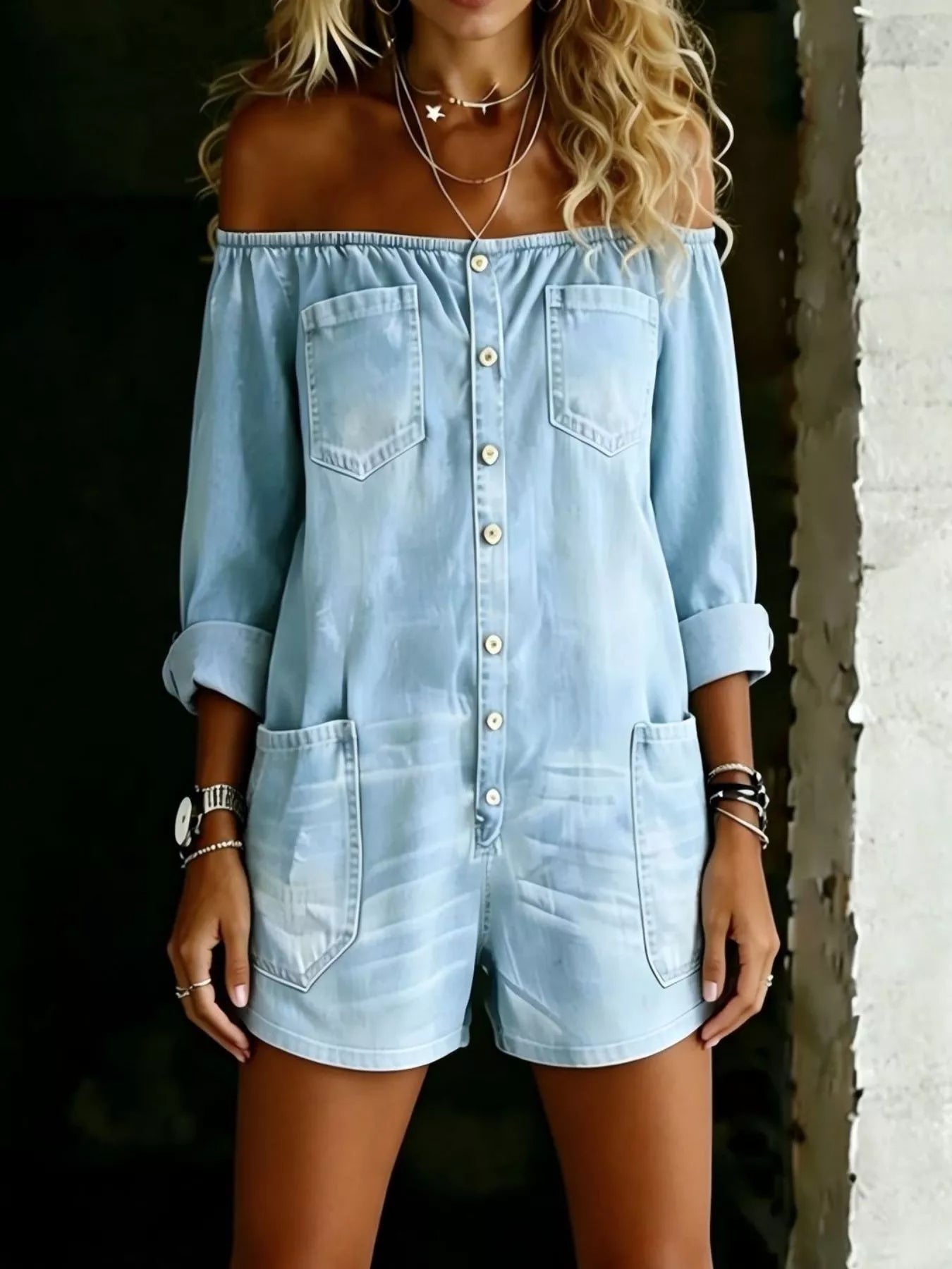 Light blue plus size button-down front off-shoulder romper by Trendsi, featuring a relaxed fit and stylish off-shoulder design.
