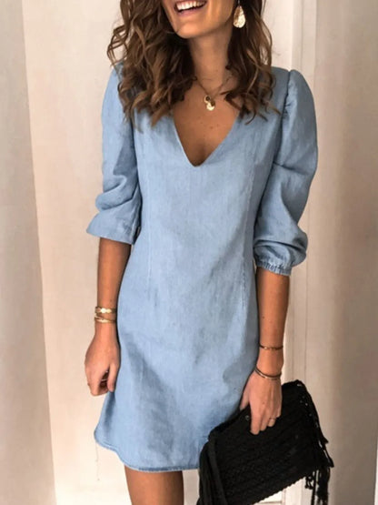 Light blue full-size V-neck half-sleeve dress by Trendsi, displayed on a hanger against a white background.