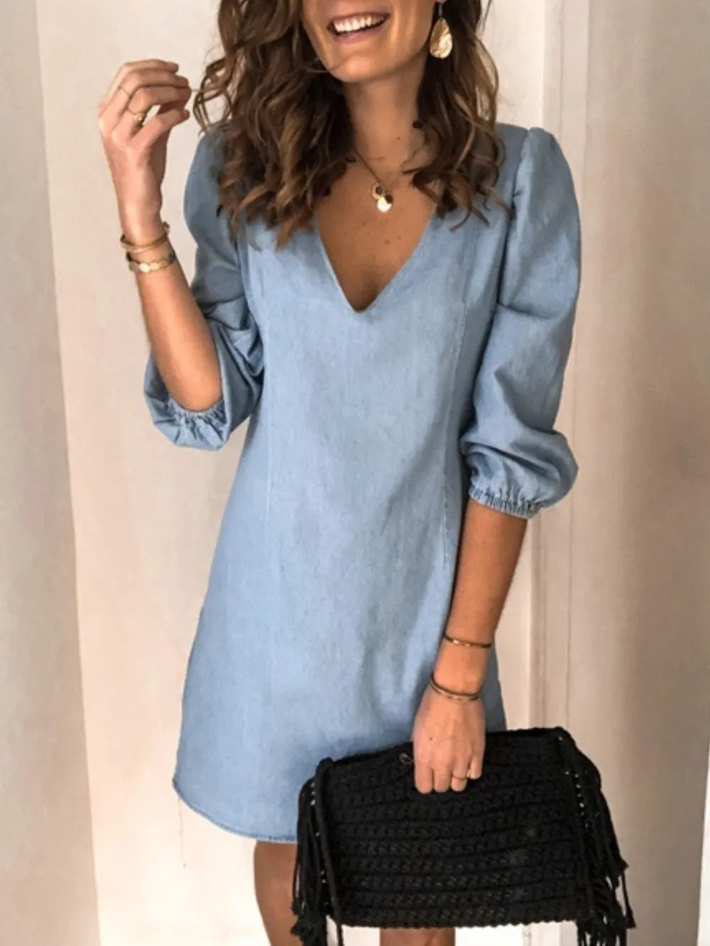 Light blue full-size V-neck half-sleeve dress by Trendsi, featuring a relaxed fit and stylish design for casual or semi-formal wear.