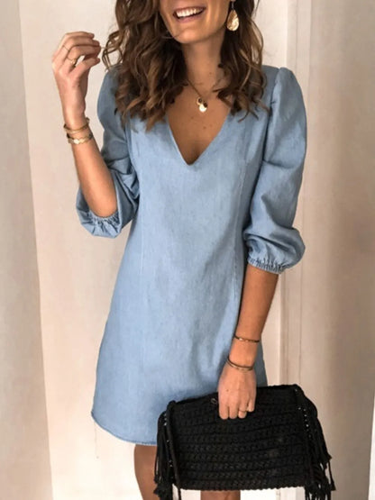 Light blue full-size V-neck half-sleeve dress by Trendsi, featuring a relaxed fit and stylish design for casual or semi-formal wear.