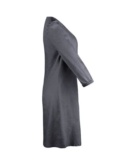 Light blue full-size V-neck half-sleeve dress by Trendsi, shown on a model, featuring a relaxed fit and stylish design.