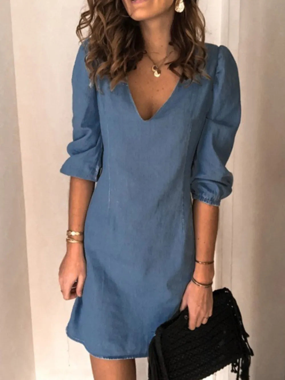 Light blue full size V-neck half sleeve dress by Trendsi, showcasing a stylish, casual design with a comfortable fit.