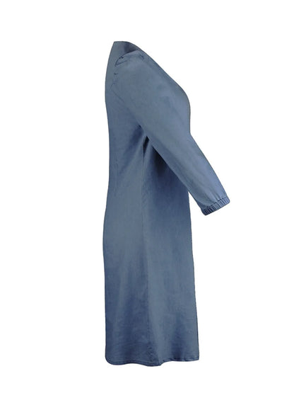Light blue full-size V-neck half sleeve dress by Trendsi, showing a flowing fit and elegant design on a mannequin.