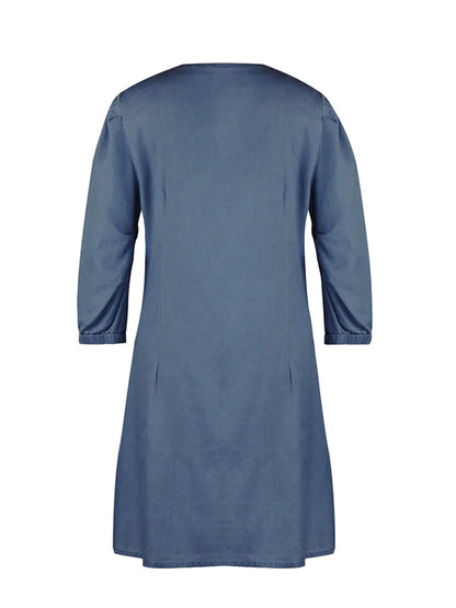 Light blue full-size V-neck half sleeve dress by Trendsi, showcasing a flowing design and elegant neckline.