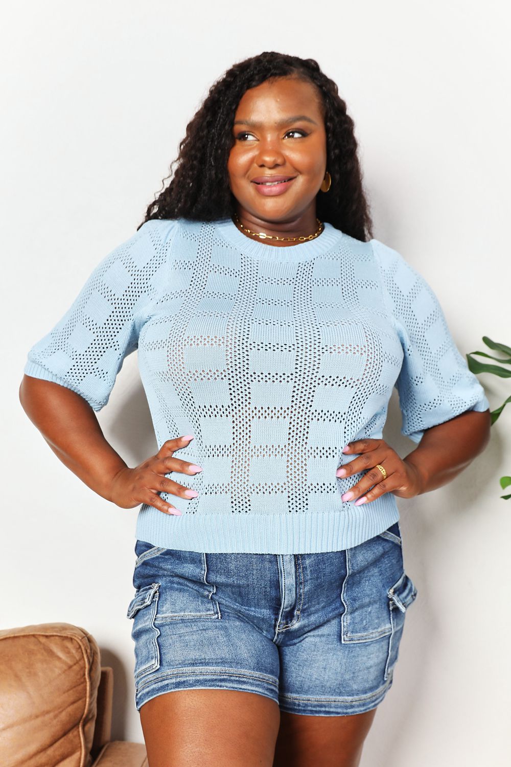Light blue Mandy ribbed knit top with round neckline and trim, featuring a fitted style from Trendsi.