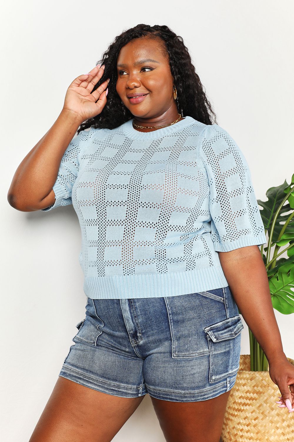 Light blue Mandy ribbed trim round neck knit top from Trendsi, featuring a fitted silhouette and soft, comfortable fabric.
