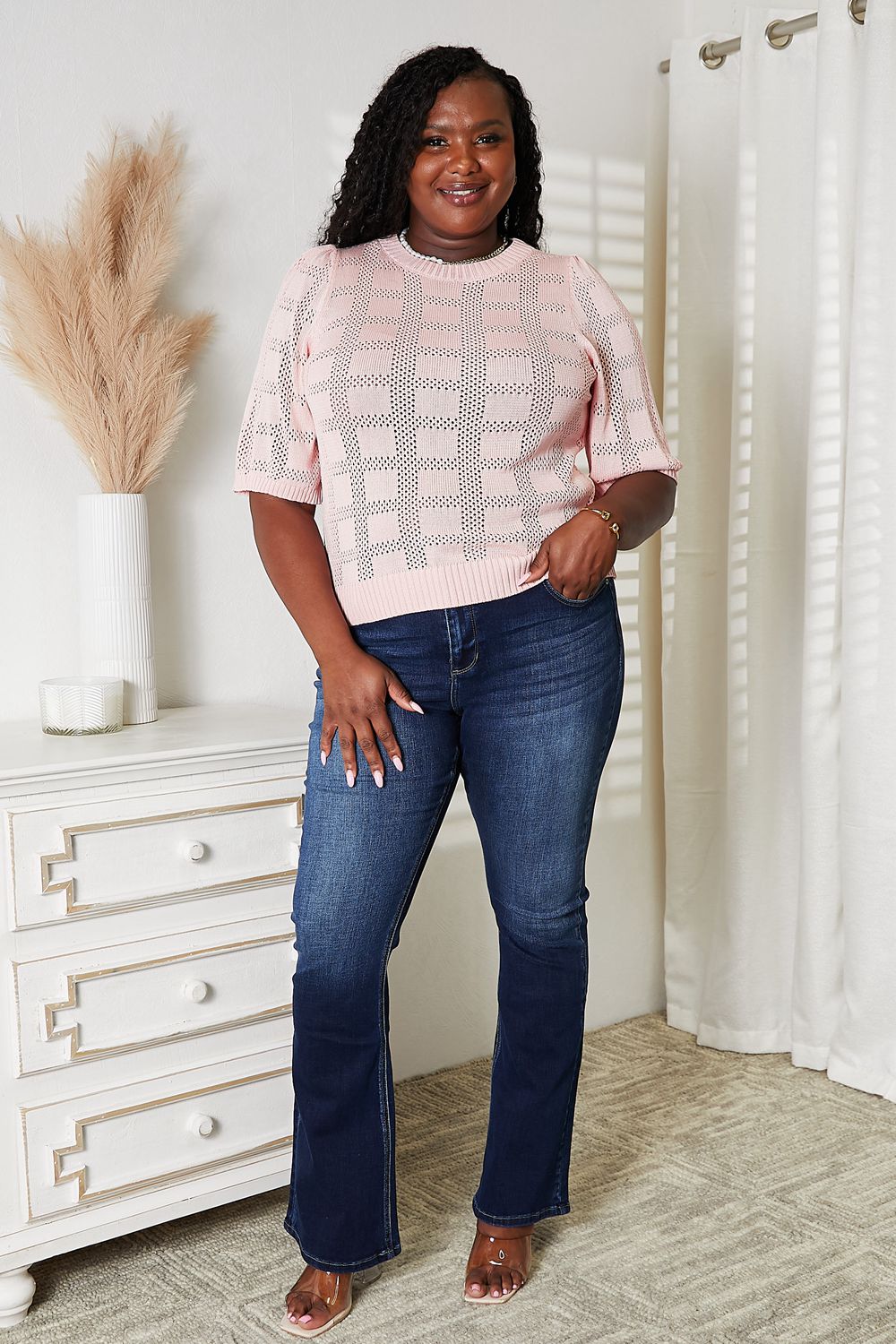 Light blue Mandy ribbed trim round neck knit top by Trendsi, featuring a close-up of the textured fabric and neckline.