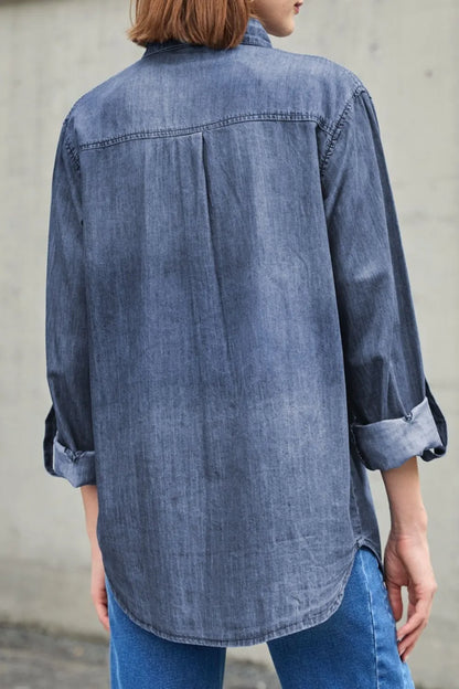 Light blue denim long sleeve top with collar and front pockets, by Trendsi, featuring a classic casual style.