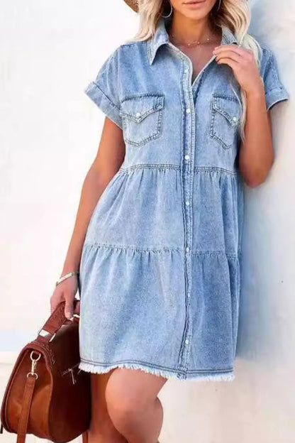 Light blue raw hem button-down denim mini dress by Trendsi, featuring long sleeves and a fitted silhouette.