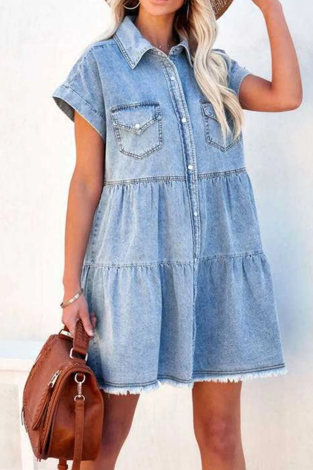 Light blue raw hem button-down denim mini dress by Trendsi featuring a classic collar and long sleeves, styled for casual wear.
