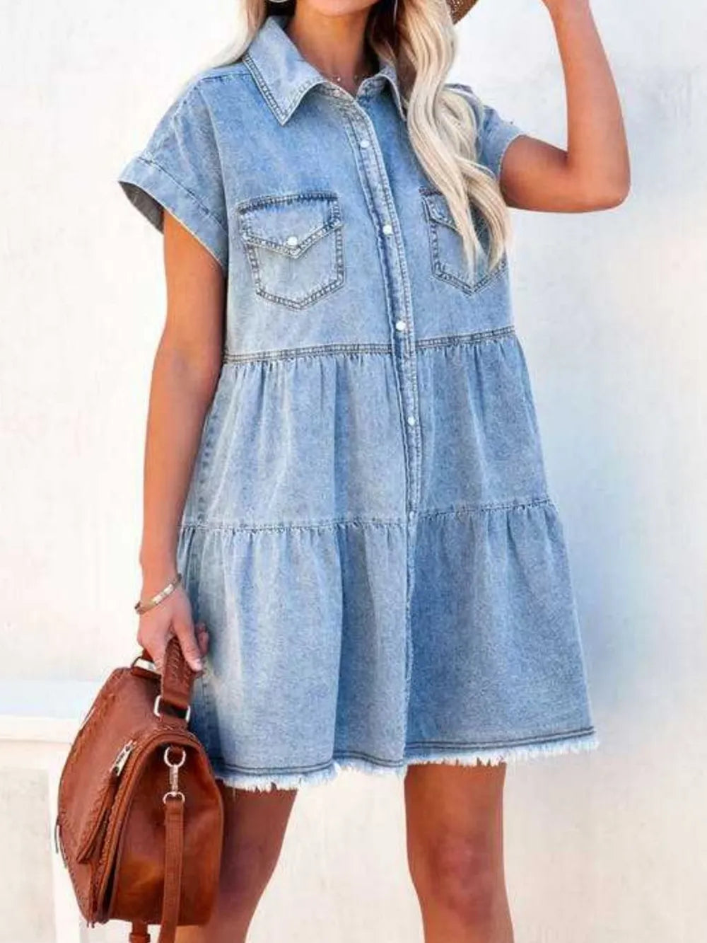Light blue raw hem short sleeve denim dress by Trendsi, featuring a casual fit and classic denim texture.