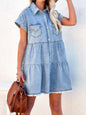 Light blue raw hem short sleeve denim dress by Trendsi, featuring a casual fit and classic denim texture.