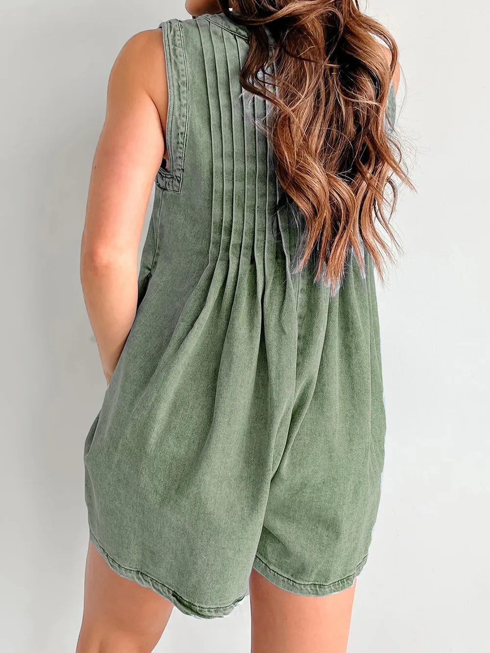 Light-blue tied romper with pockets from Trendsi, featuring a stylish design and comfortable fit.
