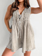 Light blue tied romper with pockets from Trendsi, featuring a relaxed fit and stylish design perfect for casual wear.