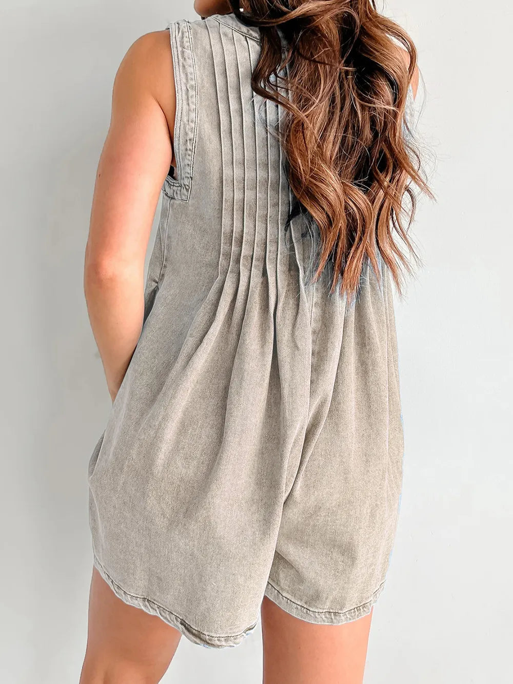 Light-blue Tied Romper with Pockets by Trendsi, featuring a relaxed fit and adjustable waist for casual summer wear.
