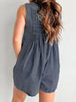 Light blue tied romper with pockets from Trendsi, featuring a casual fit and stylish design for warm weather.
